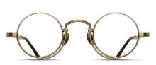 Load image into Gallery viewer, A gold optical glasses frame is pictured. The glasses have a round lens shape and feature an engraving along the rim wire.